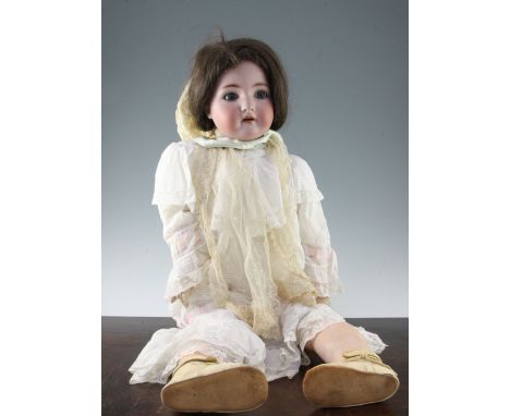 A large Simon Halbig bisque headed doll, with open mouth and teeth, with jointed composite body, 33.5in.