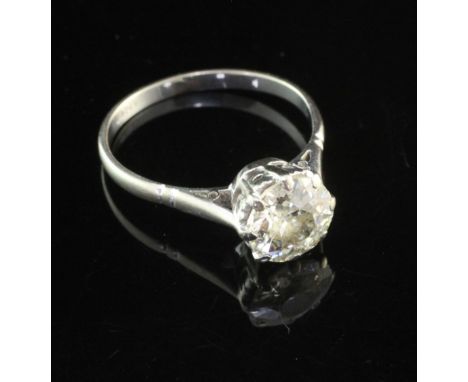 An 18ct white gold and solitaire diamond ring, the round cut stone weighing approximately 1.50ct, size O.