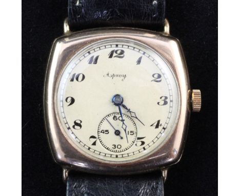 A 1920's? 9ct gold Rolex manual wind wrist watch, retailed by Asprey, with cushion shaped case and circular Arabic dial with 