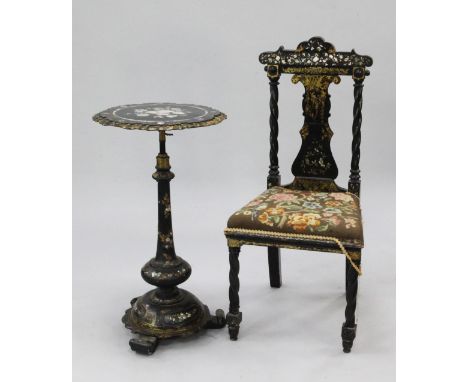 A Victorian circular papier mache painted and mother of pearl inlaid occasional table, with central vase shaped column and do