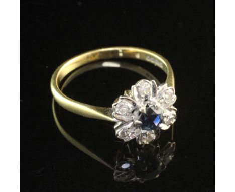 An 18ct gold, sapphire and diamond cluster ring, of flower head form, size Q.