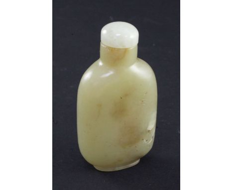 A Chinese yellow jade snuff bottle, 1750-1850, of flattened oblong form, the stone of pale yellow tone with slight russet and