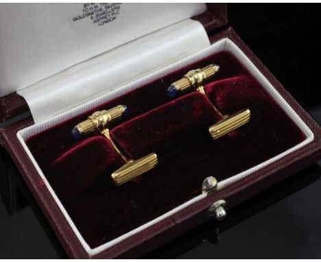 A pair of 1980's French 18ct gold and cabochon sapphire set cufflinks, retailed by Asprey & Co Ltd, gross weight 13 grams.
