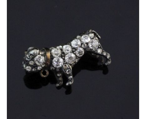 A small Victorian gold and silver, rose cut diamond and cabochon ruby set pug dog brooch, 0.75in.