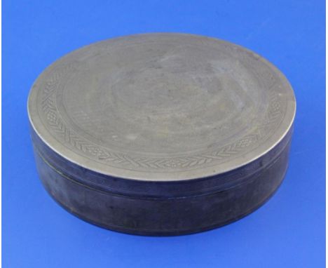 An early 20th century French engine turned 950 standard silver circular box and cover, indistinct maker's mark, dia. 6in, 12.