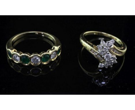 An 18ct gold and seven stone emerald and diamond half hoop ring and an 18ct gold and diamond cluster ring, sizes N & K.