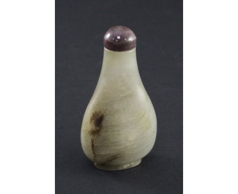 A Chinese celadon and brown jade pear shaped snuff bottle, 1750-1850, 6.1cm