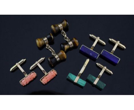 A pair of 14ct gold and lapis lazuli cufflinks and three other 9ct gold pairs, to include tiger's eye quartz, coral and malac