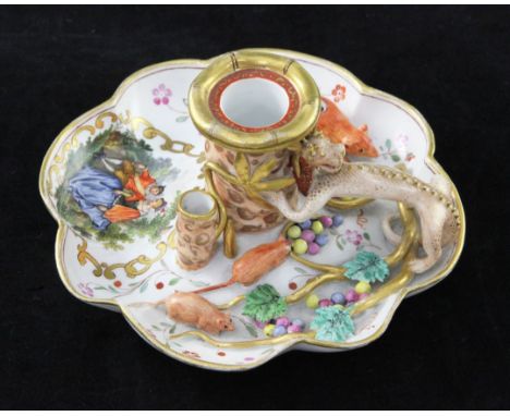 A rare Meissen octofoil shaped chamberstick, c.1770, modelled on a rare Chinese export chamberstick with a bamboo shaped cent