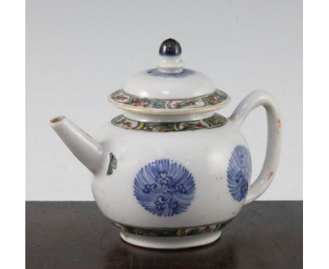 A Chinese famille verte and underglaze blue teapot and cover, Kangxi period, unusually painted with underglaze blue floral me