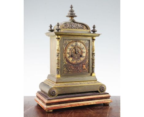 A 19th century French Henri II style ormolu mantel clock, of architectural style decorated with a huntsman and foliate scroll