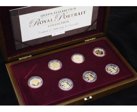 A cased Royal Mint 2003 Queen Elizabeth II Royal Portrait Collection seven coin set, containing four gold full sovereigns and