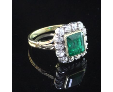 A Victorian style unmarked gold, emerald and diamond set cluster ring, of rectangular form, size L.