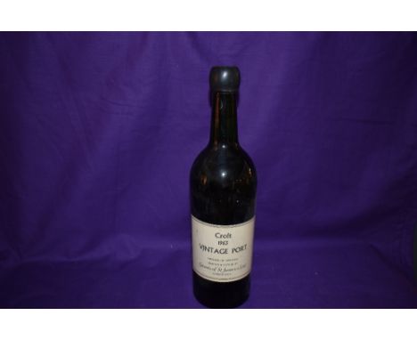 A bottle of Croft 1963 Vintage Port, bottled by Grants of St James Ltd, no age or strength capacity statement to label