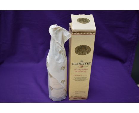A bottle of The Glenlivet Pure Single Malt Scotch Whisky, Aged 12 Years, 70cl, 40% Vol, in card box