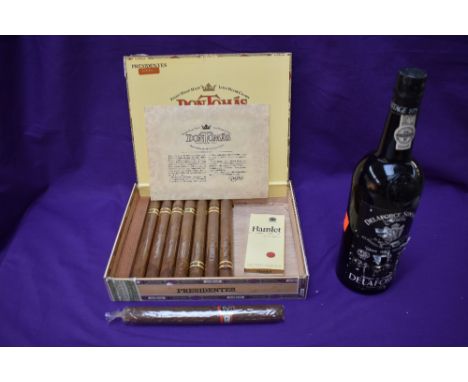 A bottle of DelaForce Sons &amp; CA Finest Vintage Port 1975, 75cl along with a Don Tomas Cigar box containing 7 cigars, one 