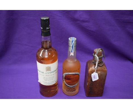 A bottle of House of Commons 8 year old Malt Scotch Whisky, 70cl, 40% vol, a 35cl bottle of Pure MaltTravel Whisky 35cl along