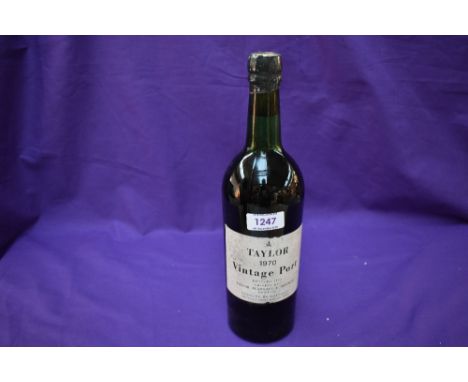 A bottle of Taylors 1970 Vintage Port, bottled 1972, shipped by Taylor Fladgate &amp; Yeatman, Oporto, imported by H Youdell 