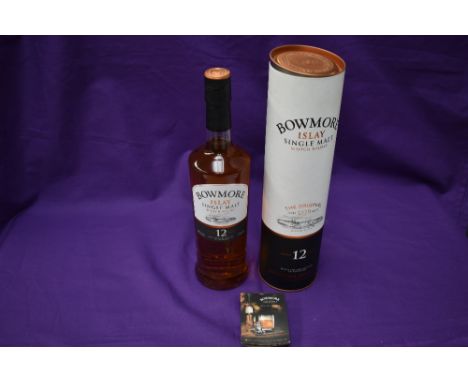 A bottle of Bowmore Islay Single Malt Scotch Whisky, aged 12 Years, 700ml, 40% Vol, in card tube