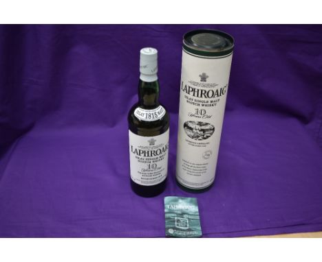 A bottle of The Laphroaig Islay Single Malt Scotch Whisky, 10 Year Old, 70cl, 40% Vol, in card tube
