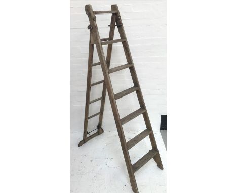 VINTAGE EXTENDING WOODEN STEP LADDER
of metamorphic design 
