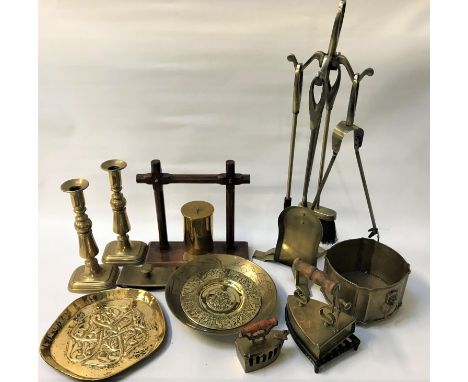 SELECTION OF BRASSWARE
including an Arts and Crafts tray with entwined motif decoration; a fire companion set on stand; two i