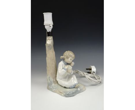 A Zaphar figural lamp base modelled as a young girl and doll