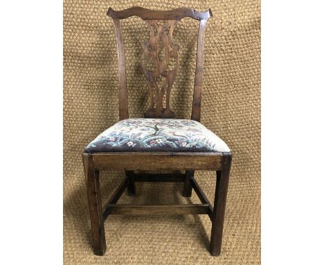A George III provincial walnut Chippendale style dining chair
