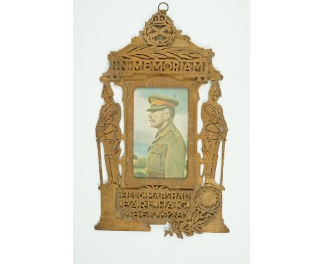 A 1928 fret-work frame and printed portrait of Earl Haig, 38 cm