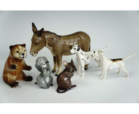 Five Beswick animals comprising a donkey, mouse, three dogs, together with a ceramic bear