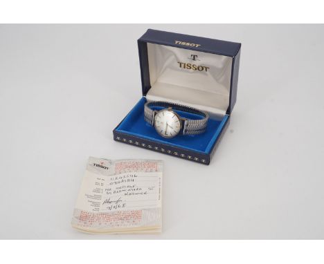 A 1960s Tissot Seastar Seven automatic wristwatch, having a brushed silver face with silver Arabic numerals at the quarters, 