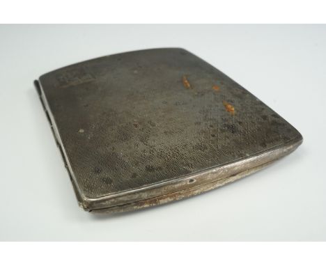 A 1930s silver cigarette case, cushion shaped and decorated with lattice pattern engine turning, 8.5 cm x 6.5 cm, 65 g