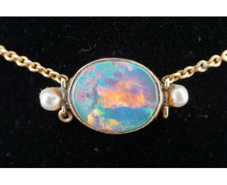 A late 19th / early 20th Century opal, seed pearl and yellow metal necklace, (a/f), opal 9 mm x 11 mm. 2.6 g