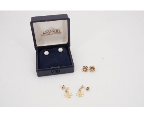A pair of contemporary pearl and 9 ct gold stud earrings, 6 mm, together with 9 ct gold flowerhead studs and 9 ct gold Maltes