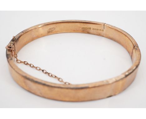 A 9 ct gold hinged bangle, (a/f), 8.8 g