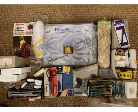A quantity of new old stock shop fastenings, sewing tools etc.