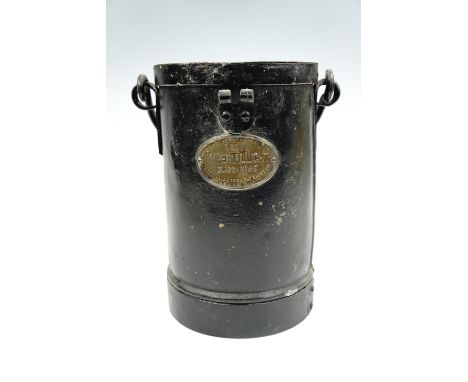 A steel cylindrical container bearing a brass plaque marked "1908 Imperial Light Class A No 27, Imperial Automatic Lights Ltd