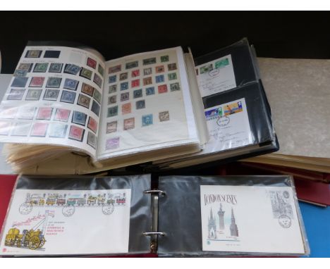 A large quantity of British Colonial and foreign stamps together with two albums of first day covers