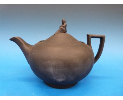 An 18thC Wedgwood black basalt teapot with widows finial, and a description from Wedgwood