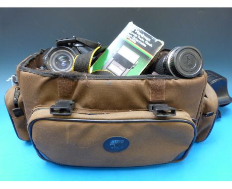 A Cosina CT-1A manual SLR camera in case together with zoom lens (Moya) wide angle Cosina flash etc