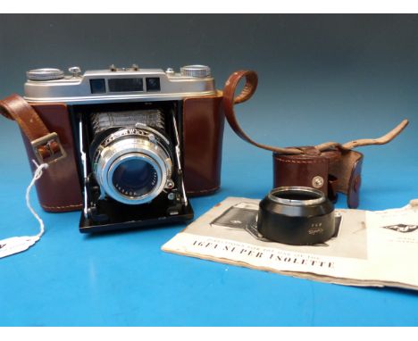 An Agfa Super Isolette folding camera in its original case with instruction manual 