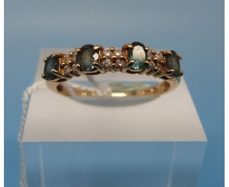 A 14ct gold ring set with Alexandrite and diamonds (size R)