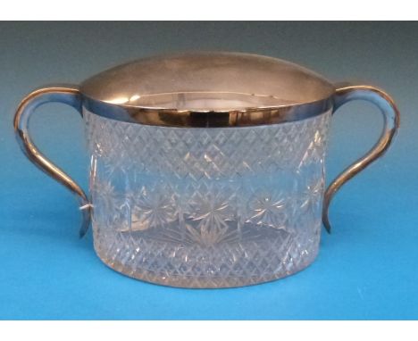 A silver plated and cut glass twin-handed casket engraved "Presented to Mrs H A Meadway by the Officers and Brethren of the C