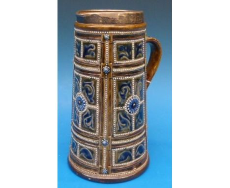 A silver mounted Doulton Lambeth jug by George Tinworth, with Art Nouveau incised and applied decoration contained within bea
