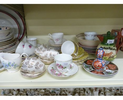 A collection of ceramics including Royal Doulton "Gone Away" hunting jug, Torquay ware, Imari teaware, meat plates etc and a 