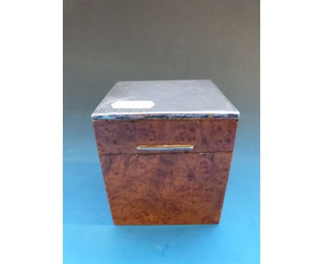 An unusual birds eye maple cigarette box with engine turned white metal top