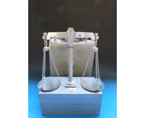 A set of Gloucestershire County Council Reverification Ltd 20g scales, in tambour fronted cabinet 
