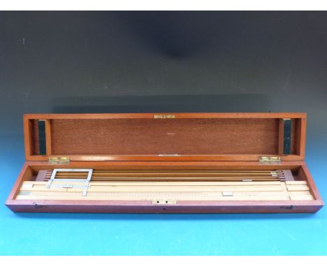 A mahogany cased draughtsman's set by Stanley, Great Turnstile Holborn, London with slide out scales marked chains and acres 