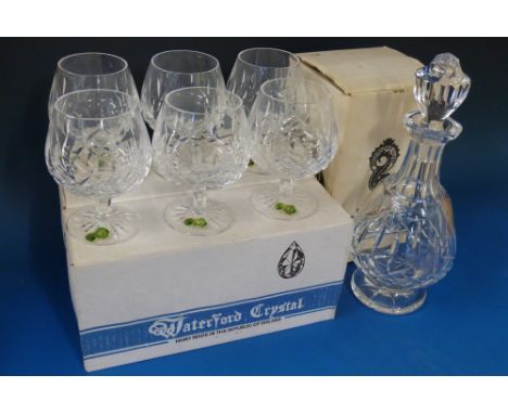 A set of six Waterford Crystal Kenmare pattern brandy glasses and decanter in original boxes