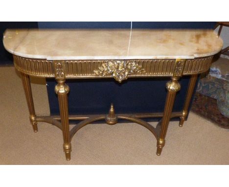 18th century style gilt console table, 140cm wide on four tapered and fluted legs. Condition reports are not available for ou